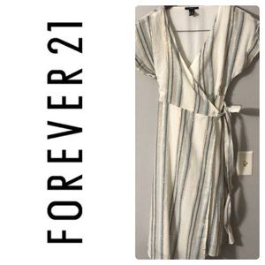 Beautiful wrap dress with gold shimmer thread